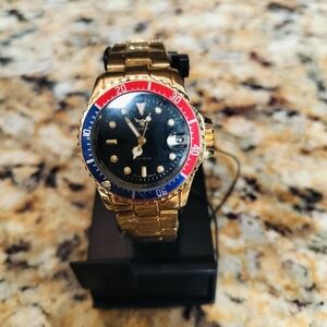Woman's red/blue bezel automatic watch
